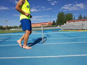 Running barefoot can be done on a track or anywhere else